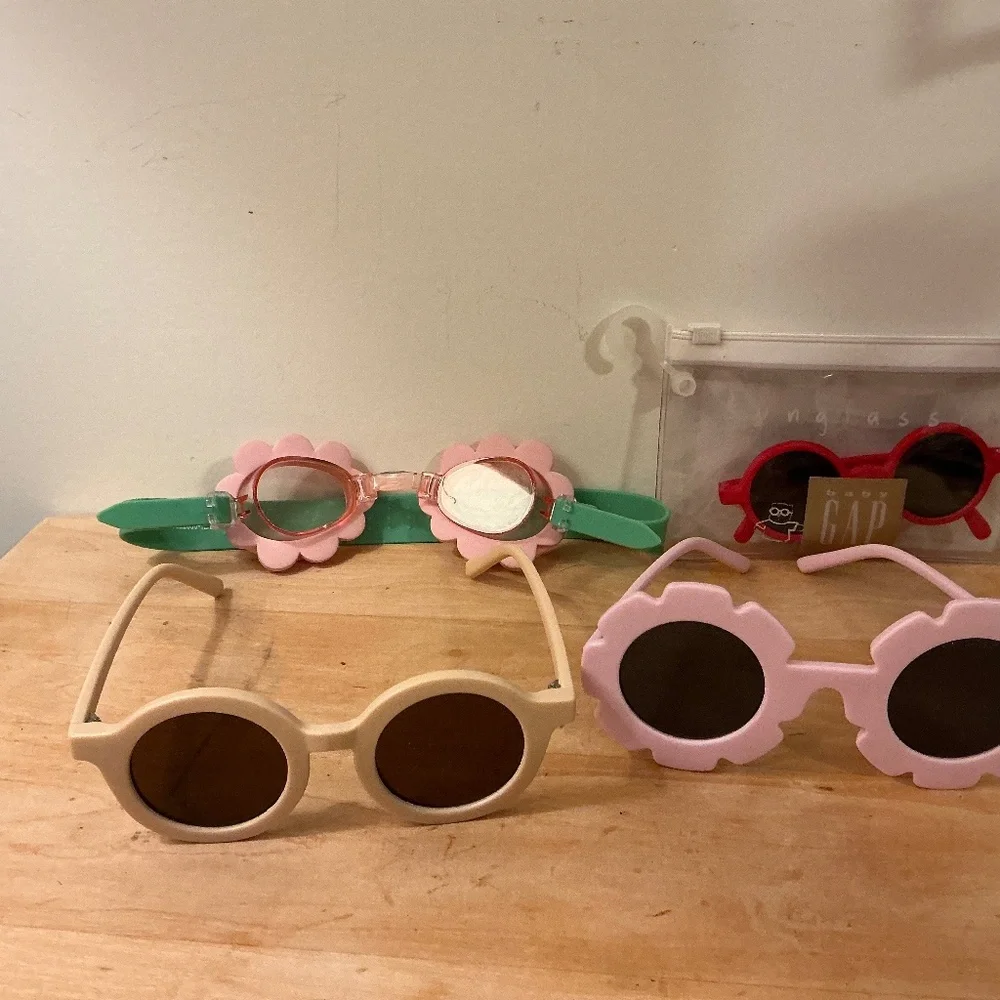 Collection of sunglasses (Baby Gap and others)and swim goggles Stephen Joseph
